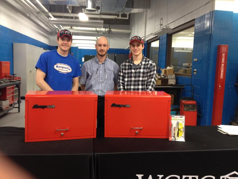 Pictured (left to right): Tyler Gray-Hoehn, Mr. Broetzmann, Aaron Bauer pose with their new tool boxes