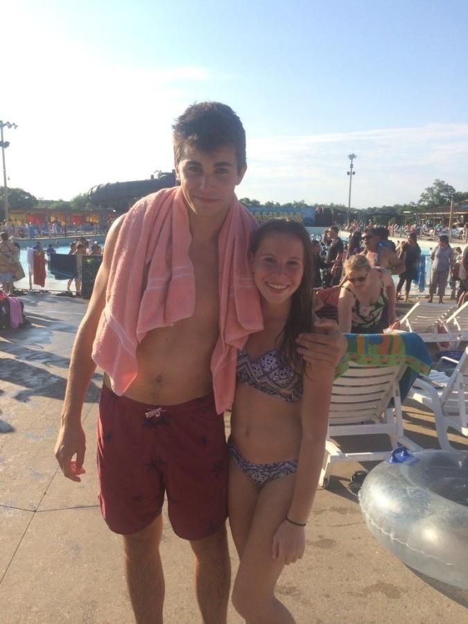 Lucas and Agathe pose for a picture on the beach