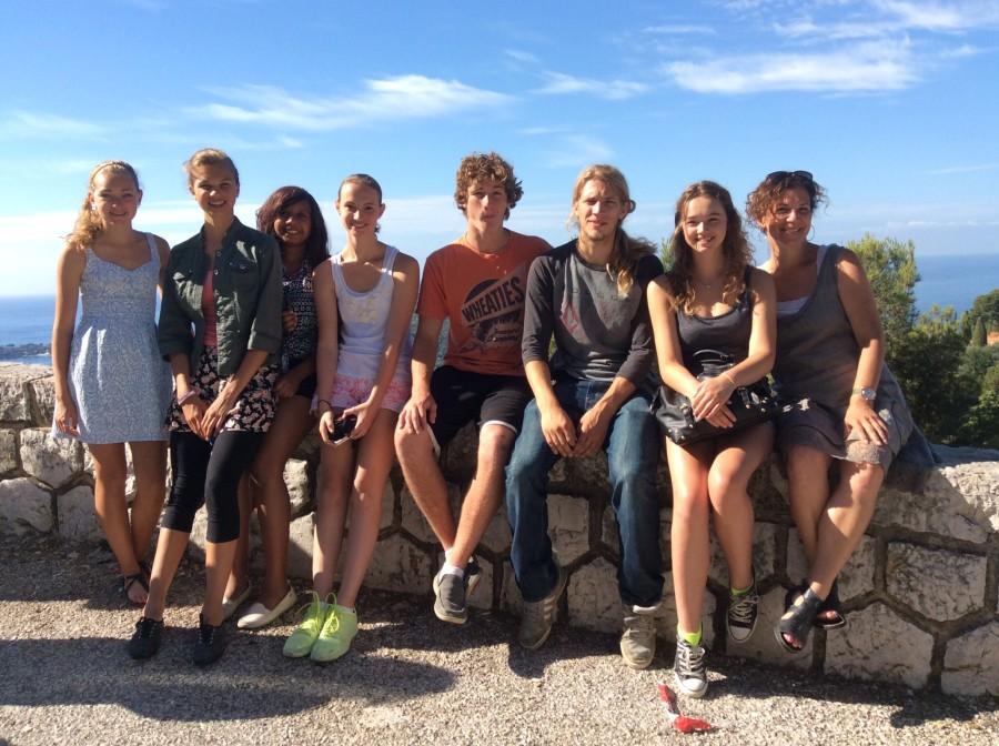 From left to right: Emma Kumer (16), Rachael Illgen (16), Nataly Rice (16), Ashleigh Manby (16), Cooper McMorris (16), Jordan McMorris (14), Corrine Fales (16), Madame Mary Mann. Madame Mann and her students are at a beach on the Mediterranean Sea in Nice, France. 