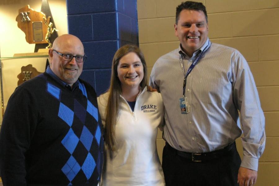 Grace Dunn poses with Athletic Director Todd Sobrilsky (Left) and Principal Brett Greutzmacher (right) Nov. 12, national signing day. Dunn signed her National Letter of Intent in commitment to golfing for the Division One Drake University Bulldogs in the fall of 2015. 