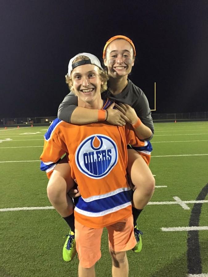 Danielle Thistle (16) and her boyfriend Marcus Oelson (16) pose together after the Powderpuff Football Game at BC Sept. 27. 