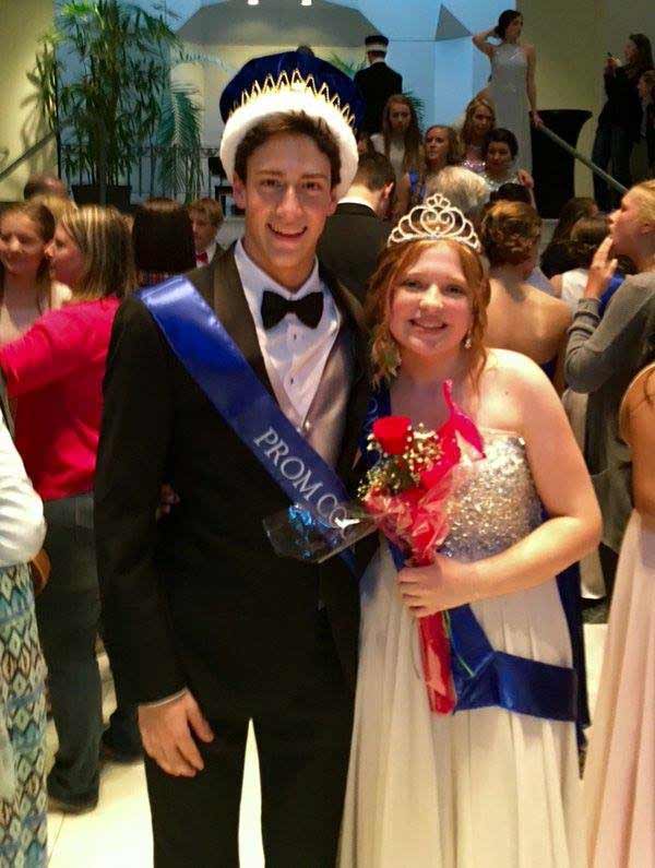 2016 Prom King, Adam Weiner (17), and Prom Queen, Sophie Bohr (17), pose together for a photo after the Grand March. They will crown the next King and Queen March 25th, 2017.