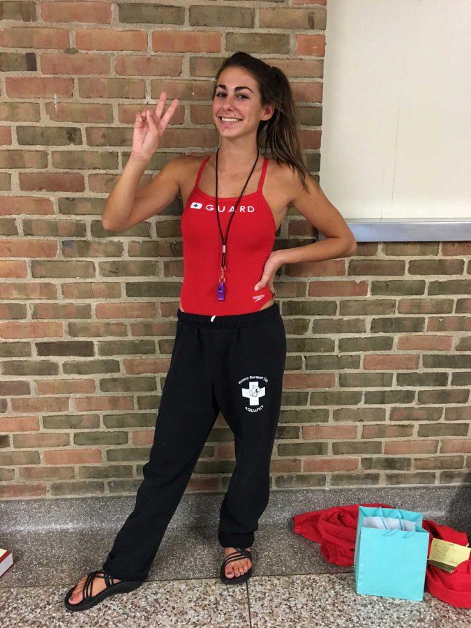Senior+Caitlin+Locante+wore+her+life-guarding+swimsuit%2C+sweats%2C+and+a+whistle+for+Part+Time+Job+Day.+She+works+as+a+lifeguard+and+diving+coach+at+Western+Racket+Club.+