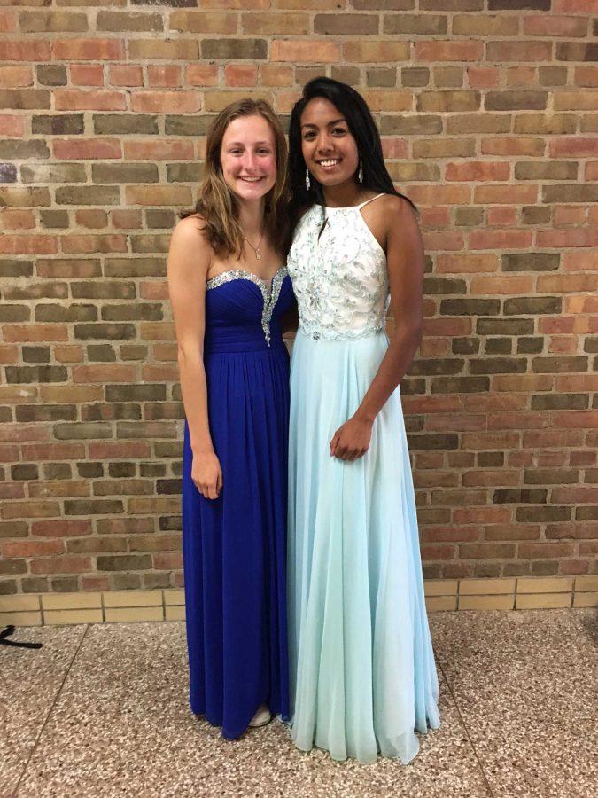 Seniors Megan Rittler (17) and Christina Ramesh (17) wore their prom dresses to school on Thursday.