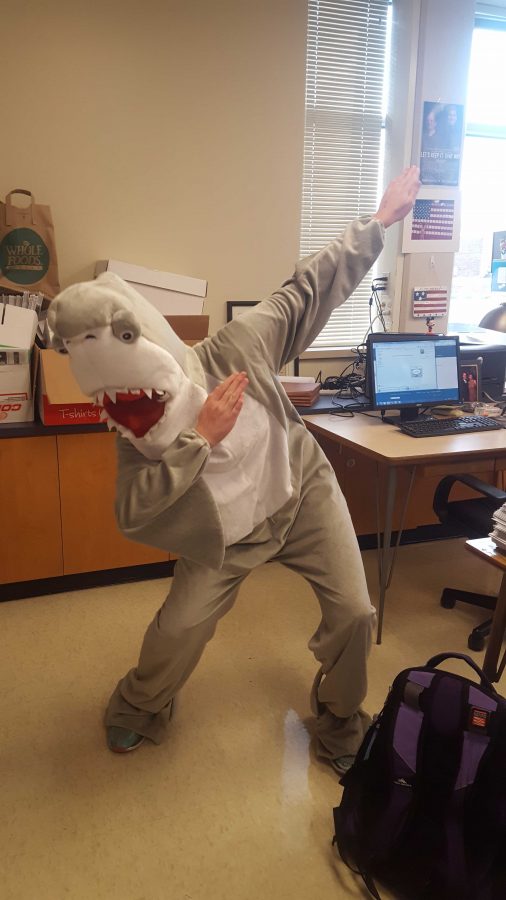 Madison Hummel (17) dressed as a shark for Halloween. I wore sunglasses under my shark helmet of victory in order to look dope.