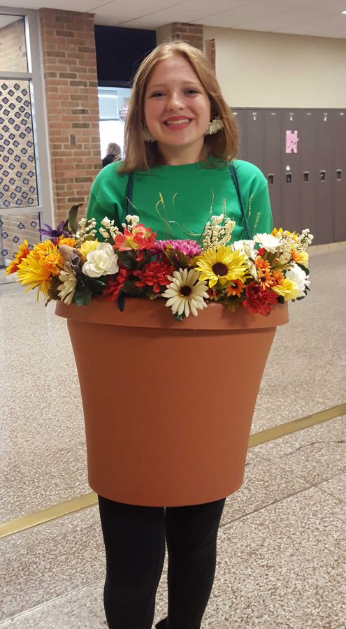 Sophie Bohr (17) dresses as a pot of plants. She found a huge pot at Michaels and crafted the costume herself. 