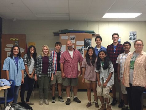 (From left to right) Seniors Leslie Bonilla, Hema Gharia, Vivian Walbrun, Michael Anderson, Becca Yi, Brett Fong, Ananya Rajaraman, Casey Reiner, Rahul Javalagi, and Maclaren Krueger smile with Mr. Keir after surprising him with the best form of flattery.