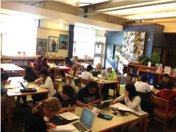 The Mock Trial team intently studies this year’s case at their case release party.