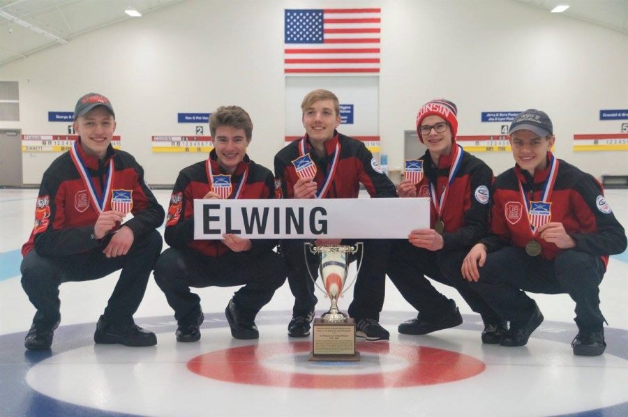 Team Elwing poses with their trophy after an exciting victory.