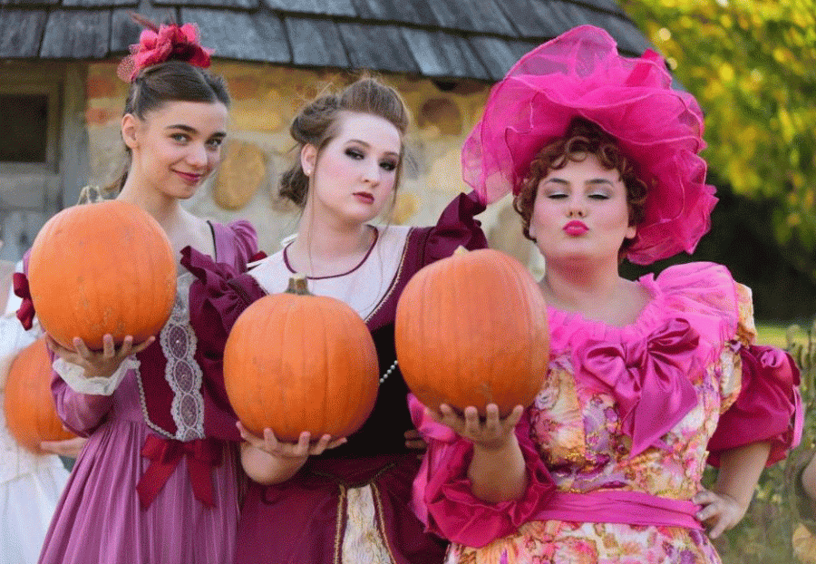 From left to right, Nikki Ranney (‘18), Kara Olander (‘18), and Sophie Michalski (‘18) pose for a photo, dressed up  in their magical attire for the upcoming play. Be sure to come to watch the play from Nov 16-19 at the Sharon Lynn Wilson Center!