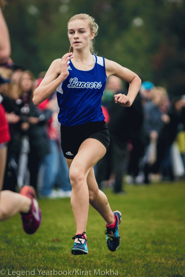 Julia Neustedter (‘22) races to the finish line at the Conference Meet. 