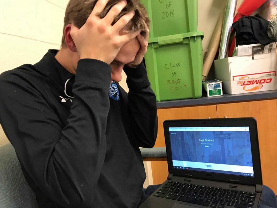 Kevin Jacobson (‘19) stresses over the implications of the loss of net neutrality. His screen indicates the site he was trying to access was blocked by the School District of Elmbrook. Many fear this will also be the case with internet providers at home.