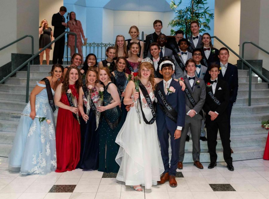The 2018 BCHS Prom Court poses on the steps of the Intercontinental Hotel with the newly coronated Prom King and Queen Adarsh Rajaraman and Lila Nelson, respectively,  in the center. From left to right: bottom row - Sasha Pavlovic, Amy Keane, Emma Fox, Tess Jensen, Lila Nelson, Adarsh Rajaraman, Chris Casey, Blake Boles; second row - Grace Rudek, Eva Vang, Ellie Kumer; third row - Molly Stritesky, Makenna Lemke, Ben Kindler, Daniel Michaels, Danny Cleary; fourth row - Alice McCullough, Chibueze Chioma, Patrick Ramesh, Vaughn Goehrig; fifth row - Kimberly Wetjen, Owen Eppel, Brandon Cimbalnik, Joey Cleary. 