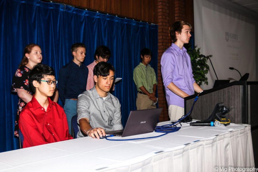 Students present their new software to aid the nonprofit organization Heros for Healthcare. (Left to right) Back row: Vanessa Osterberg(‘18), Leo Brunette (‘19), Nick Hill(‘18), Andrew Kim (‘19). Front row: Caleb Liu (‘19), Ben Tan (‘19), and Adam Nygard(‘18)