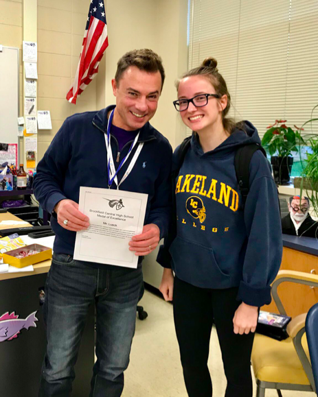 Mr. Lueck awards Mia Wedel ('20) with the BCHS Medal of Excellence