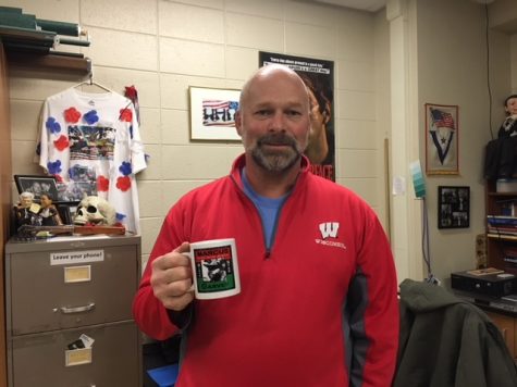 Mr. Keir smiles with his mug, a past Christmas present. Christmas is a time known for receiving gifts but it is also a time for giving. Brookfield Central also has a program that gives the opportunity to pitch in money to help out underprivileged Elmbrook families during the holidays.