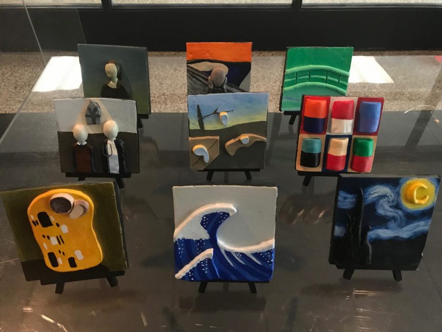 “The hardest part of the process was painting the pieces as I specialize more in 3D than 2D art. My favorite part was choosing what nine paintings to include and deciding how I wanted to represent them in a 3D form.”

- Olivia Kroeplin (‘20)