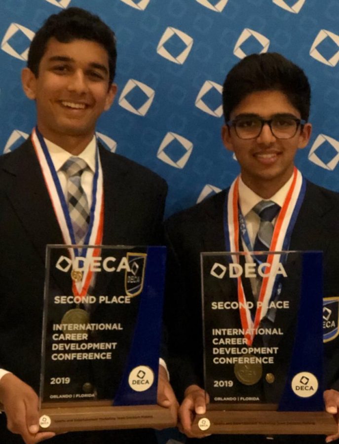 Pranay Reddy (‘19) and Rajat Mittal (‘19) beam with joy with their DECA glass. Reddy claimed that the highlight of the ICDC trip was “hanging with other people.” He also had some advice for the chapter, “Be confident and have fun!”