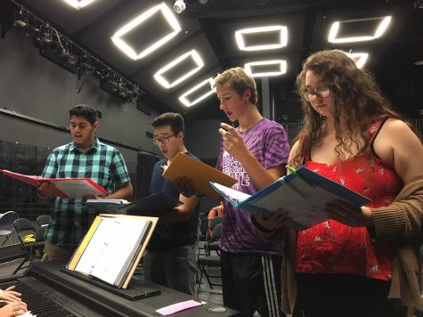 Left to right: Nishant Namboothiry (‘22), Jonah Morioka (‘20), Michael Long (‘22), and Natalie Lara (‘20) rehearse their parts
for the future performance. The cast rehearses in the Black Box almost every day after school, singing tunes such as Topsy
Turvy and The Bells of Notre Dame. The rehearsal schedule becomes more rigorous as the premier date nears.