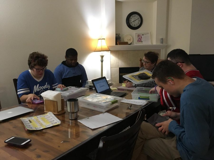 From left to right: Melissa, Elijah, Megan Rindal, Brandon (back), and Brendan. Project
STRIVE participants plan out their week with Transitional Coordinator Megan Rindal.
Rindal hopes to help the students generalize their learned skills from classroom to home
environments.