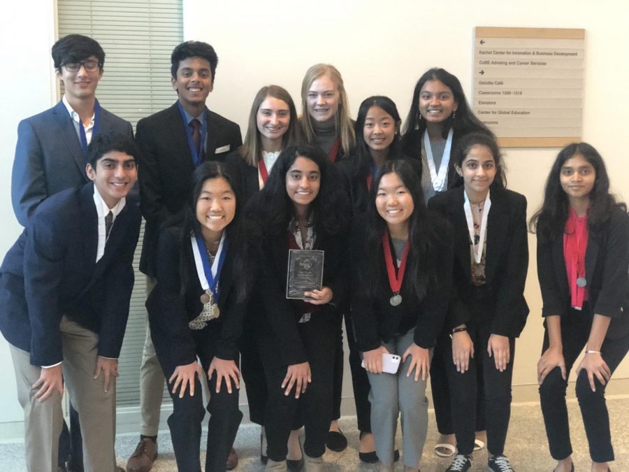 Those who modeled at Mini-Districts are featured here in this photo, Mini-Districts is a low stress way for students to get a feel for the DECA competition environment!