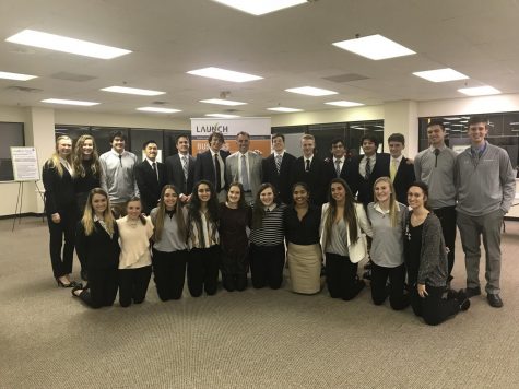 High school students from LAUNCHs 2017-2018 Business Analytics strand pose professionally for the camera after completing autumn project.